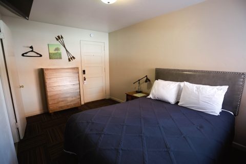 Comfortable double queen bed in a cozy Douglas, WY hotel room.