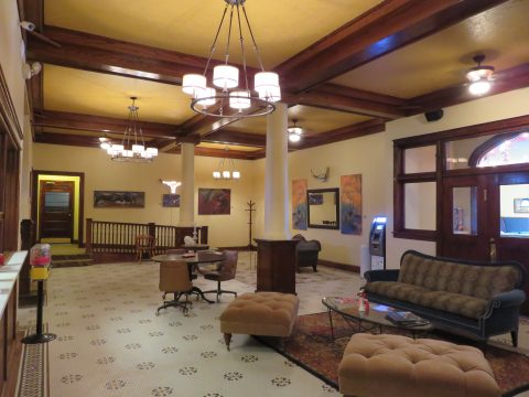 Lobby of Hotel LaBonte in Douglas, Wyoming with vintage decor and seating areas.