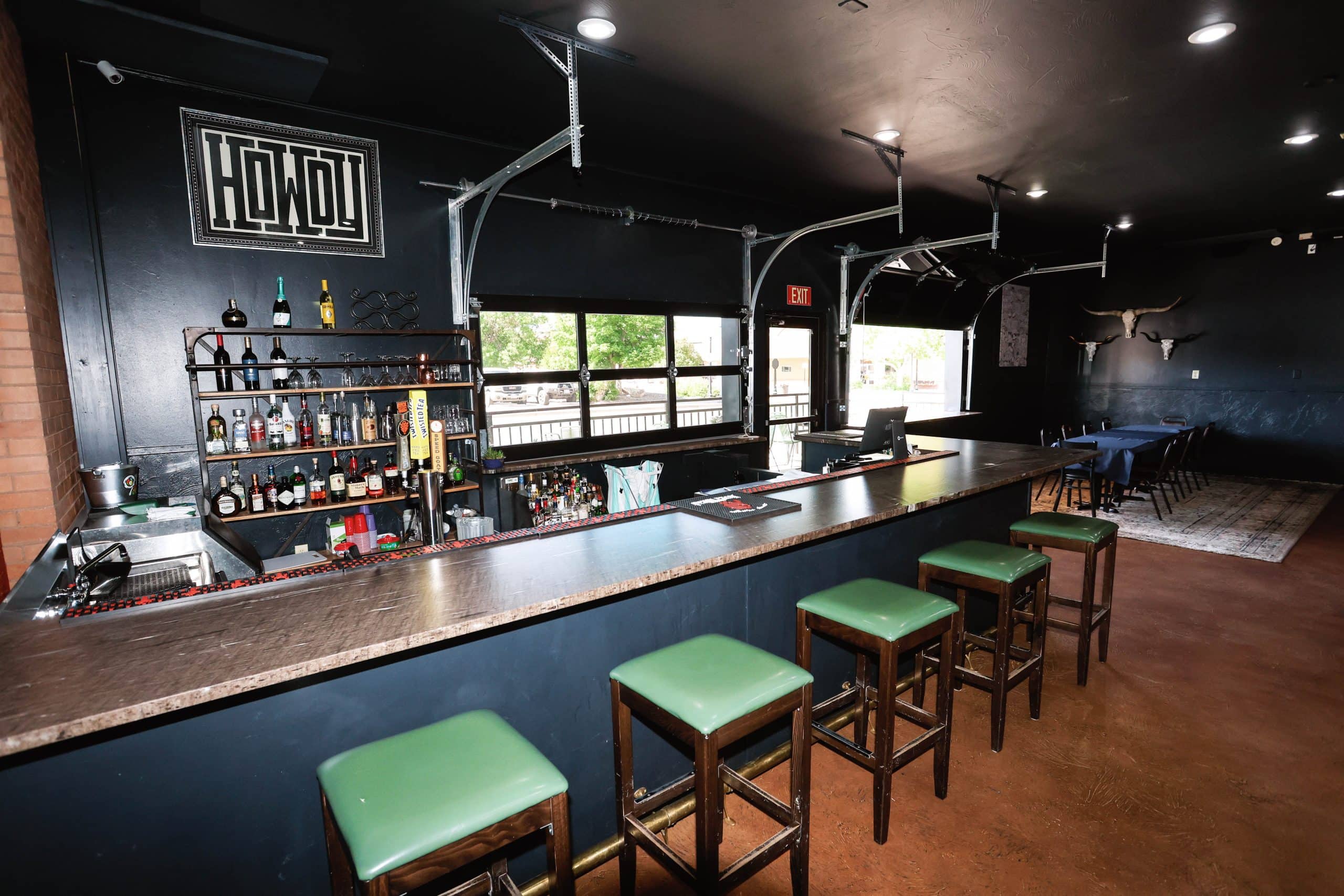 Interior view of the bar at Hotel LaBonte in Douglas, WY with seating and decor.