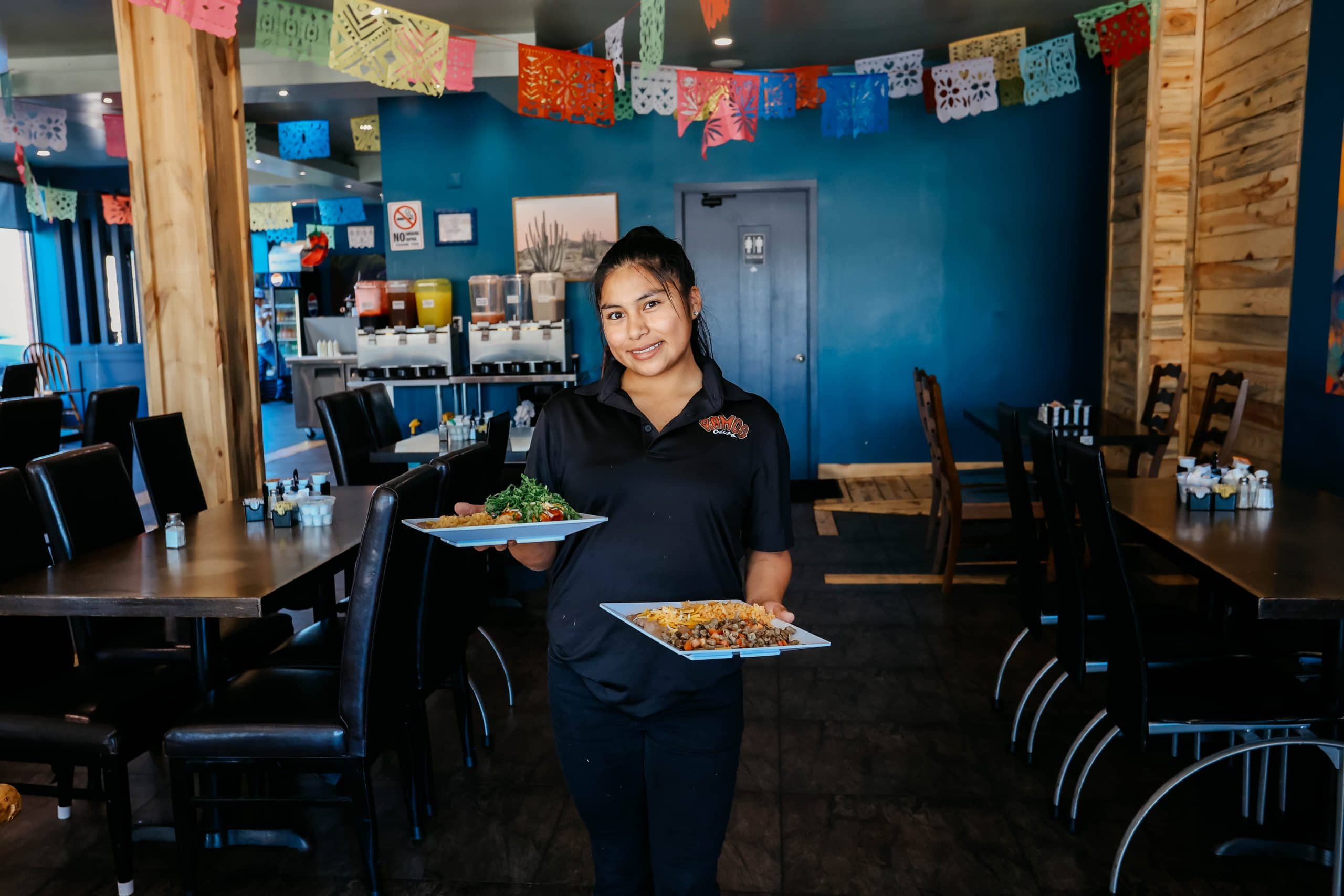 Waitress serving food at Hotel LaBonte in Douglas Wyoming.