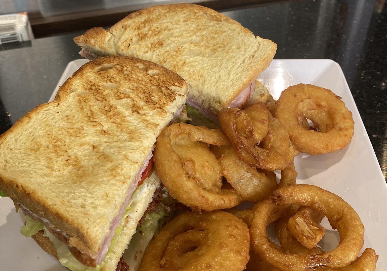 Club sandwich with onion rings at Hotel LaBonte in Douglas WY.